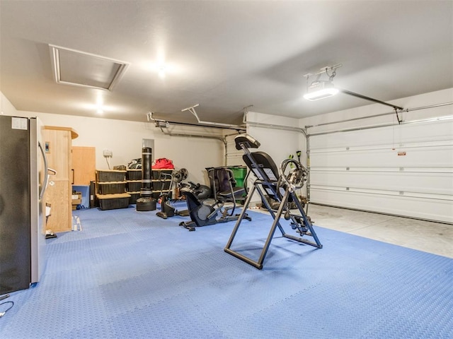 3317 Open Prairie Trl, Yukon, OK 73099 - garage with freestanding refrigerator
