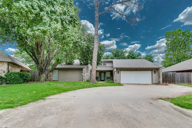 816 Woodbury Dr, Edmond, OK 73034 - view of front of property with an attached garage and concrete driveway