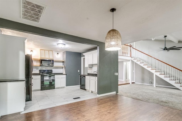 816 Woodbury Dr, Edmond, OK 73034 - kitchen with appliances with stainless steel finishes, dark countertops, backsplash, ceiling fan, and open floor plan