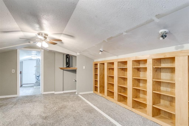 816 Woodbury Dr, Edmond, OK 73034 - carpeted empty room with ceiling fan, a textured ceiling, and lofted ceiling