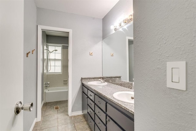 816 Woodbury Dr, Edmond, OK 73034 - bathroom featuring double vanity, tile patterned flooring, and shower / washtub combination
