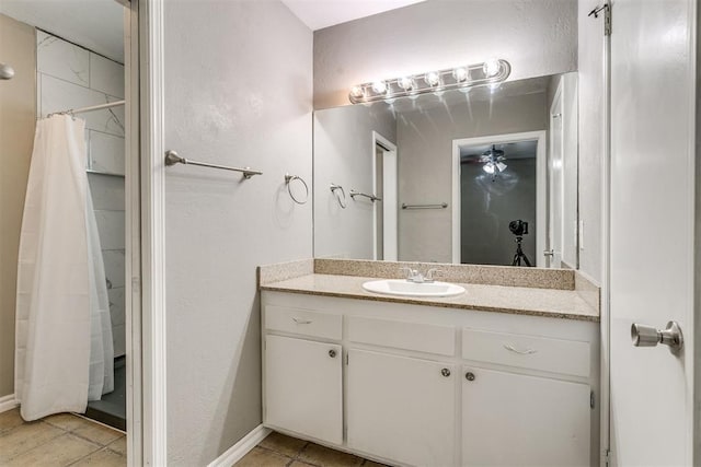 816 Woodbury Dr, Edmond, OK 73034 - bathroom featuring vanity, tile patterned flooring, and a shower with shower curtain