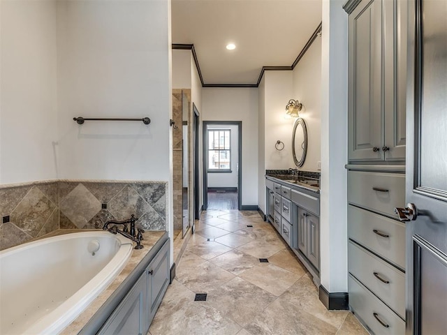 23 NE 3rd St, Oklahoma City, OK 73104 - bathroom with vanity, a bath, a shower stall, and ornamental molding
