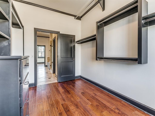 23 NE 3rd St, Oklahoma City, OK 73104 - spacious closet featuring dark wood-type flooring