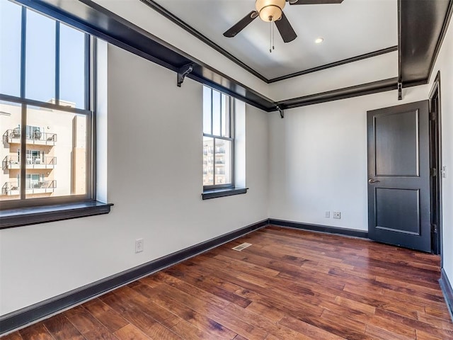 23 NE 3rd St, Oklahoma City, OK 73104 - unfurnished room with wood finished floors, ceiling fan, and baseboards
