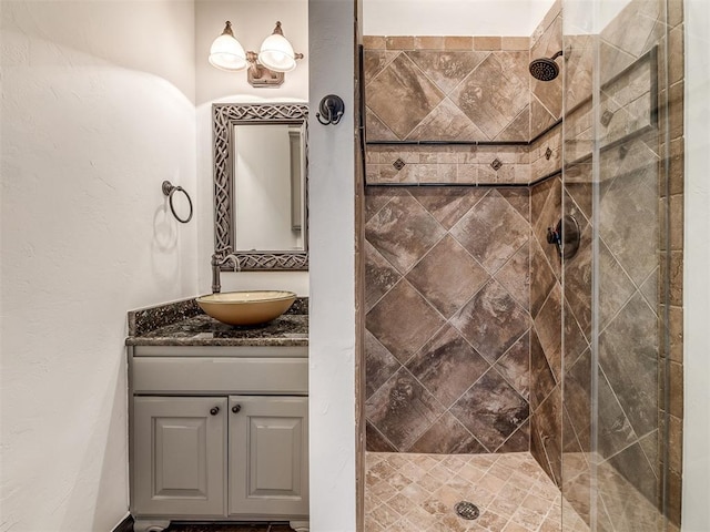 23 NE 3rd St, Oklahoma City, OK 73104 - full bathroom featuring vanity and tiled shower