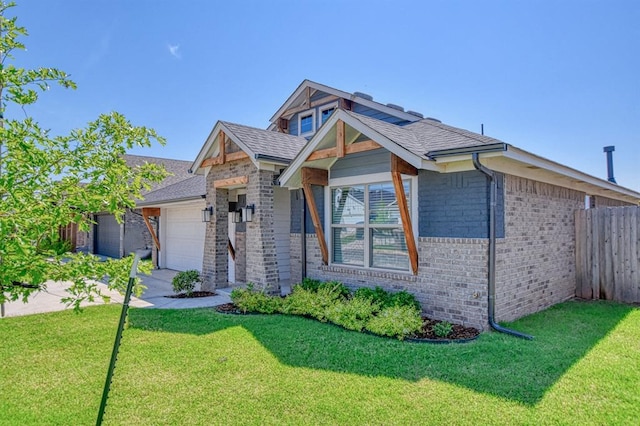 3232 Pagoda Pead Dr, Yukon, OK 73099 - view of front of house featuring brick siding, an attached garage, and a shingled roof