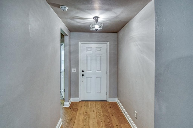 3232 Pagoda Pead Dr, Yukon, OK 73099 - entryway featuring light wood-style floors and baseboards
