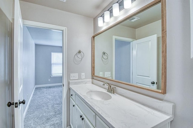 3232 Pagoda Pead Dr, Yukon, OK 73099 - bathroom featuring vanity and baseboards