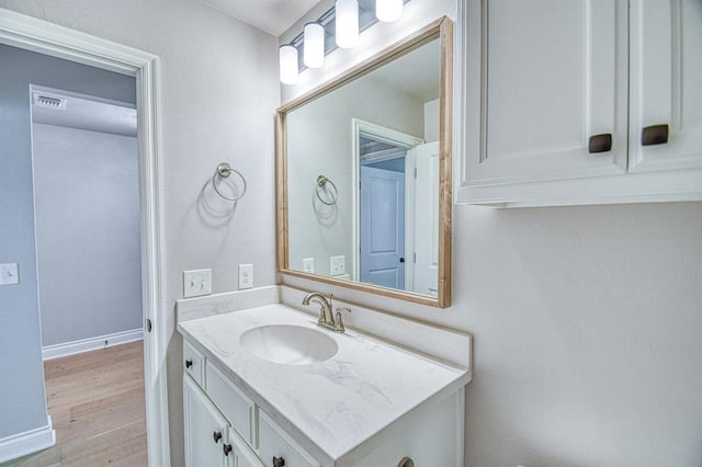 3232 Pagoda Pead Dr, Yukon, OK 73099 - bathroom with vanity and wood finished floors