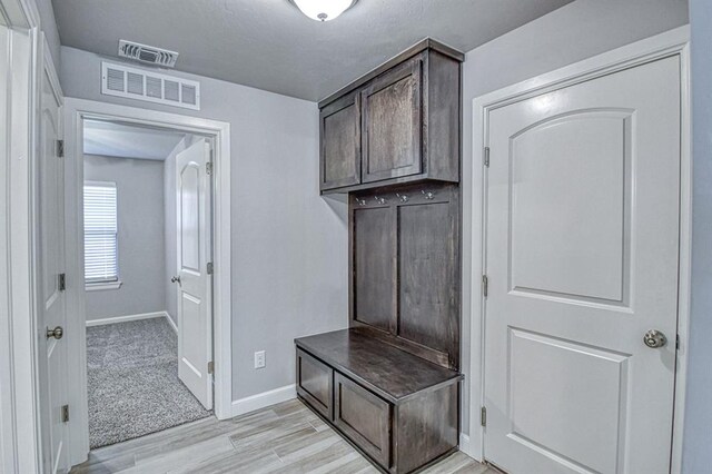 11100 NW 131st St, Yukon, OK 73099 - mudroom with light wood-style floors and baseboards