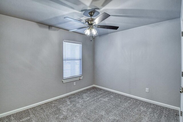 11100 NW 131st St, Yukon, OK 73099 - carpeted spare room featuring a ceiling fan and baseboards
