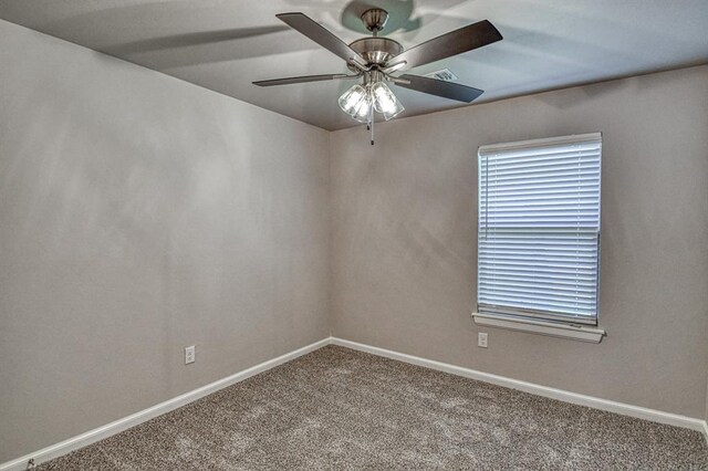 11100 NW 131st St, Yukon, OK 73099 - carpeted empty room featuring baseboards and ceiling fan