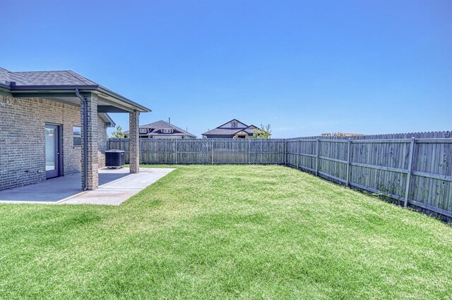 11100 NW 131st St, Yukon, OK 73099 - view of yard with a patio area and central air condition unit