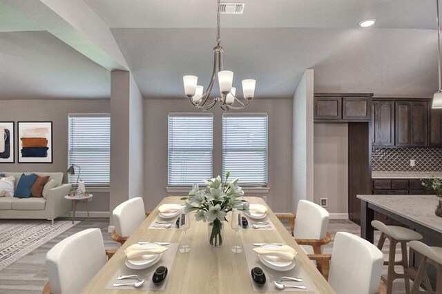 11100 NW 131st St, Yukon, OK 73099 - dining space with a chandelier and light wood-style floors