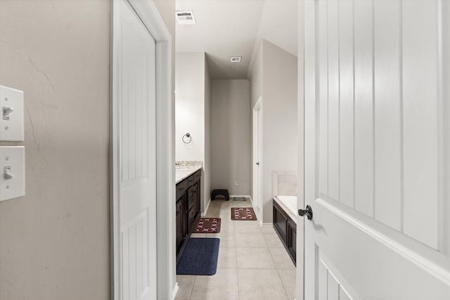 3401 First Capitol Cir, Guthrie, OK 73044 - full bathroom featuring tile patterned floors, vanity, and baseboards