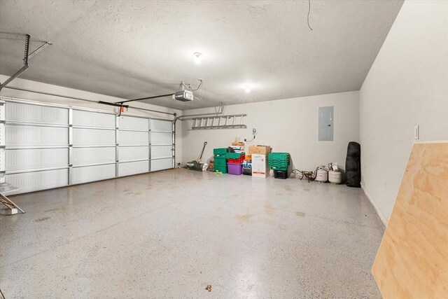 3401 First Capitol Cir, Guthrie, OK 73044 - garage featuring electric panel and a garage door opener
