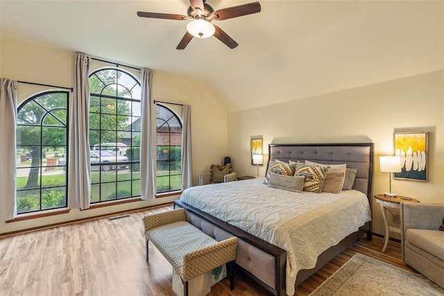 4001 Innsbrook Ct, Norman, OK 73072 - bedroom with lofted ceiling, wood finished floors, and ceiling fan