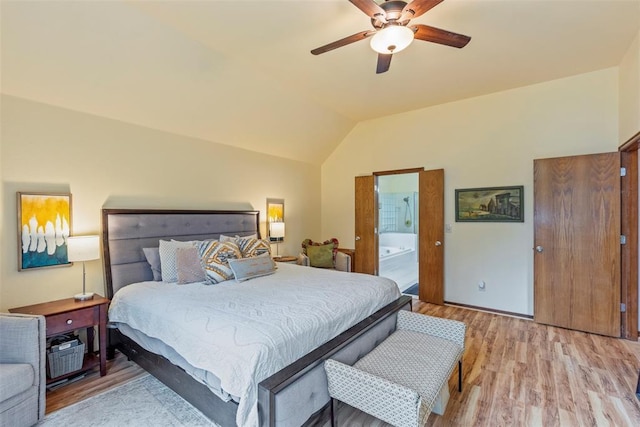 4001 Innsbrook Ct, Norman, OK 73072 - bedroom with light wood-style floors, vaulted ceiling, ensuite bathroom, and ceiling fan