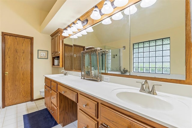 4001 Innsbrook Ct, Norman, OK 73072 - bathroom with double vanity, tile patterned floors, and a shower stall