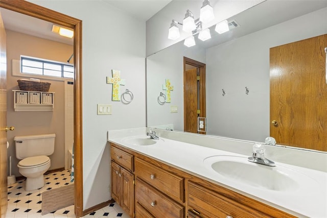 4001 Innsbrook Ct, Norman, OK 73072 - bathroom with double vanity and tile patterned floors