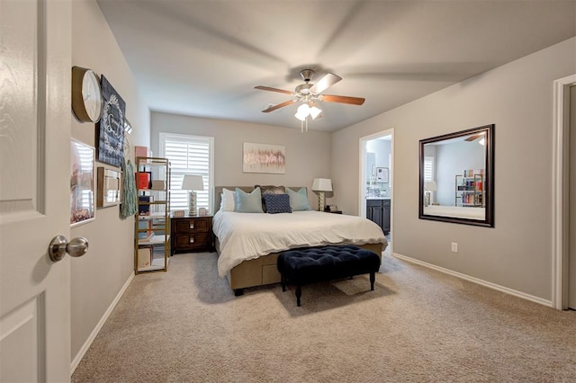 11513 SW 26th St, Yukon, OK 73099 - carpeted bedroom featuring baseboards, connected bathroom, and a ceiling fan
