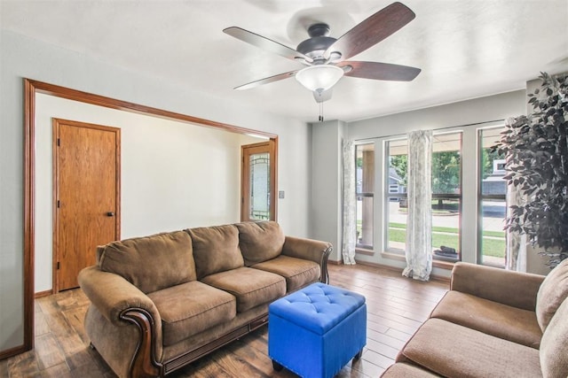 4211 Blue Sage Rd, Norman, OK 73072 - living area featuring a ceiling fan and hardwood / wood-style floors
