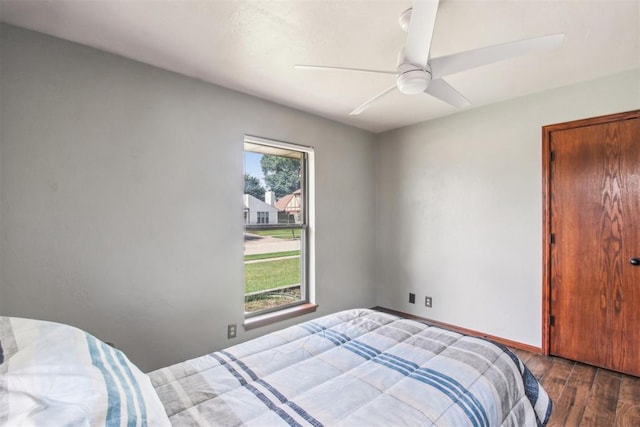 4211 Blue Sage Rd, Norman, OK 73072 - bedroom featuring wood finished floors and a ceiling fan