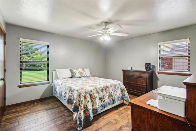 4211 Blue Sage Rd, Norman, OK 73072 - bedroom featuring wood finished floors and a ceiling fan