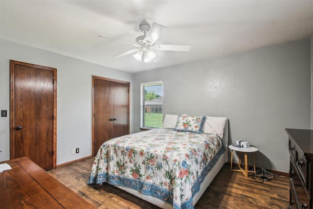 4211 Blue Sage Rd, Norman, OK 73072 - bedroom with wood finished floors, baseboards, and a ceiling fan