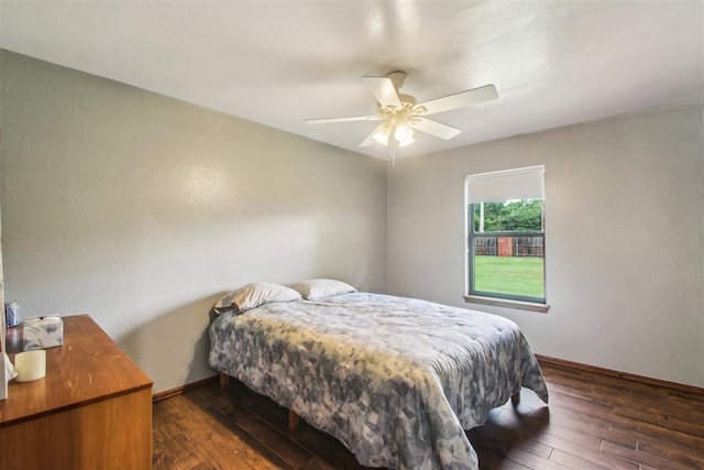 4211 Blue Sage Rd, Norman, OK 73072 - bedroom with hardwood / wood-style floors, baseboards, and a ceiling fan