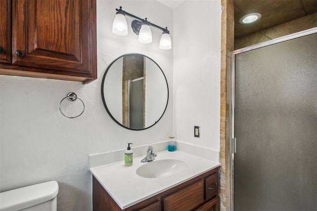 4211 Blue Sage Rd, Norman, OK 73072 - bathroom featuring vanity, toilet, and a shower stall
