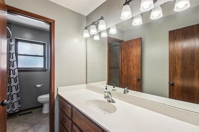 4211 Blue Sage Rd, Norman, OK 73072 - bathroom with vanity, toilet, tile patterned floors, and a shower with shower curtain