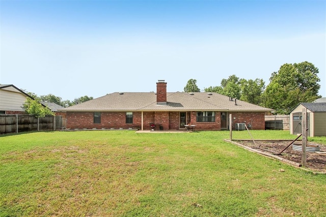 4211 Blue Sage Rd, Norman, OK 73072 - rear view of property featuring a patio area, a chimney, brick siding, and central air condition unit