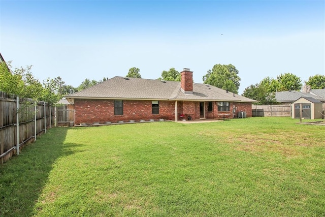 4211 Blue Sage Rd, Norman, OK 73072 - rear view of property with brick siding, a chimney, and a patio