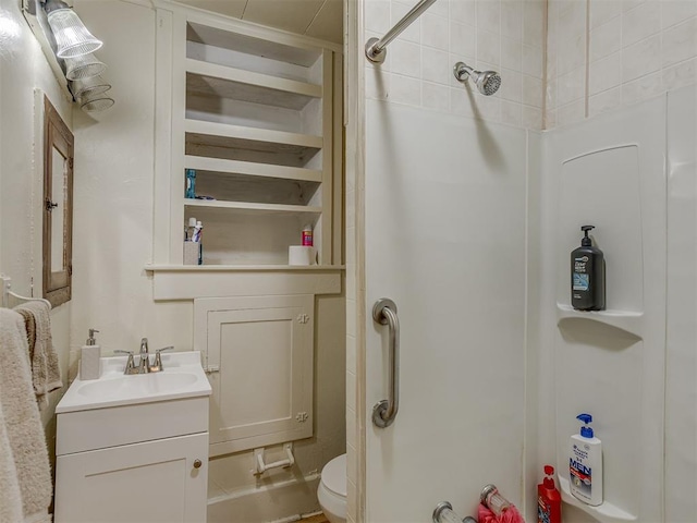 934 N Beard Ave, Shawnee, OK 74801 - bathroom featuring a shower, vanity, and toilet
