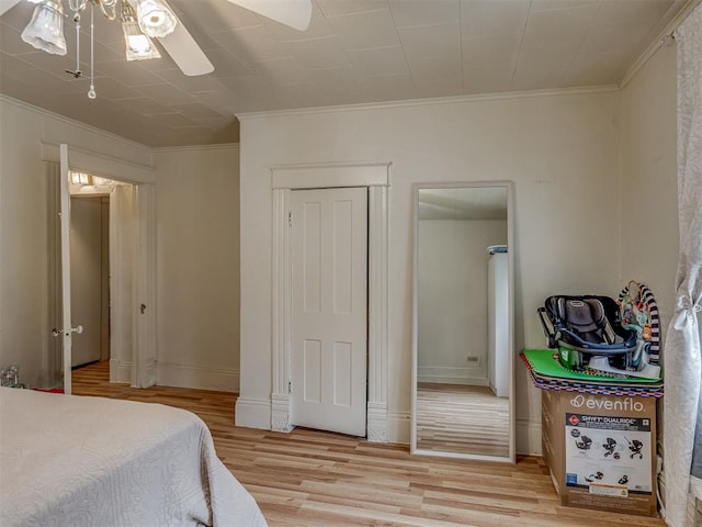934 N Beard Ave, Shawnee, OK 74801 - bedroom featuring light wood-type flooring, ornamental molding, baseboards, and a ceiling fan