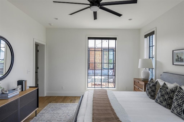 1801 Runway Blvd, Oklahoma City, OK 73108 - bedroom featuring multiple windows, wood finished floors, and ceiling fan