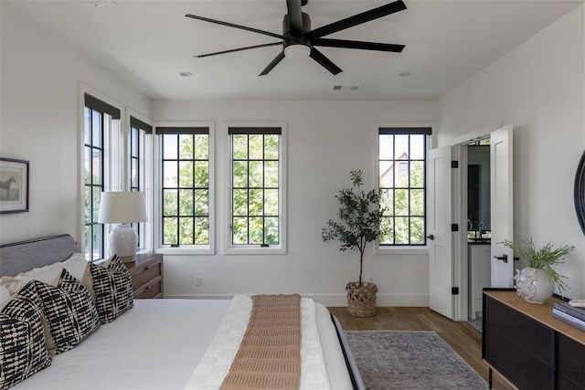 1801 Runway Blvd, Oklahoma City, OK 73108 - bedroom featuring wood finished floors and ceiling fan