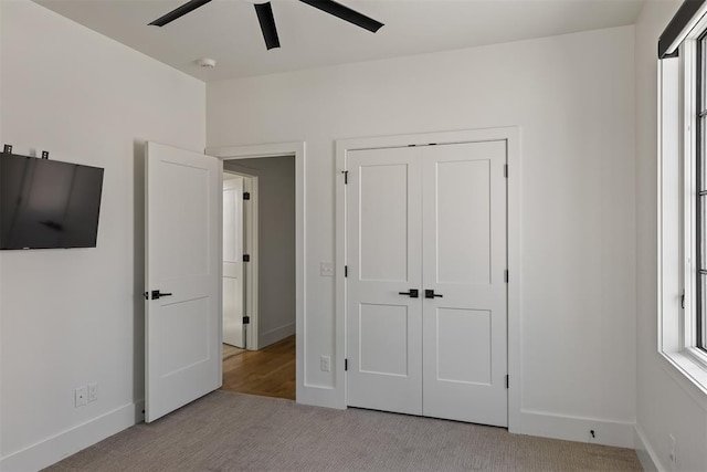 1801 Runway Blvd, Oklahoma City, OK 73108 - unfurnished bedroom with carpet flooring, a closet, and a ceiling fan