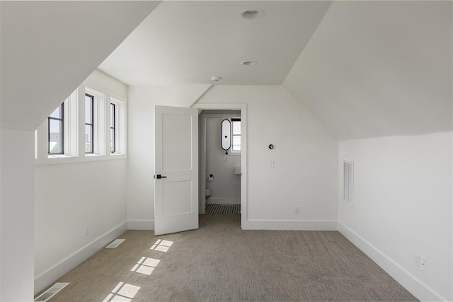1801 Runway Blvd, Oklahoma City, OK 73108 - additional living space with carpet flooring and lofted ceiling