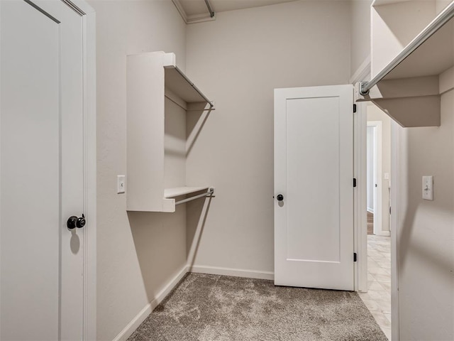 915 Kings Canyon Rd, Norman, OK 73071 - spacious closet with carpet floors