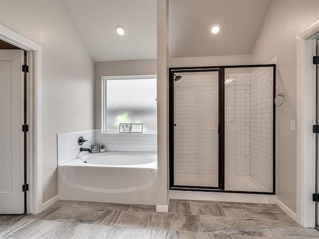 915 Kings Canyon Rd, Norman, OK 73071 - bathroom with a garden tub, a shower stall, baseboards, and vaulted ceiling