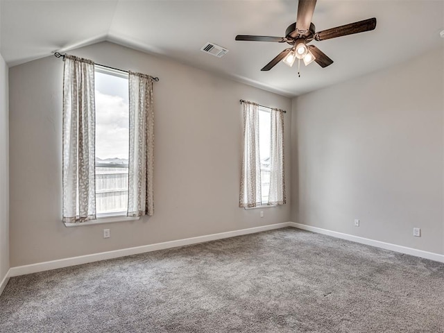 915 Kings Canyon Rd, Norman, OK 73071 - carpeted empty room featuring a ceiling fan, baseboards, and vaulted ceiling