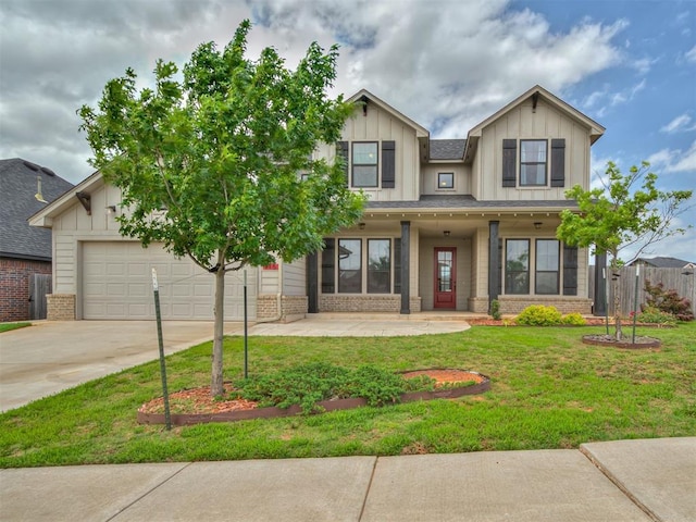 915 Kings Canyon Rd, Norman, OK 73071 - craftsman-style house with brick siding, concrete driveway, board and batten siding, a garage, and covered porch