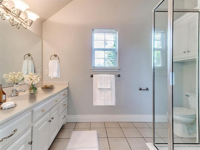 1031 Hidden Valley Ln, Choctaw, OK 73020 - bathroom with vanity, tile patterned flooring, a chandelier, and a shower with shower door