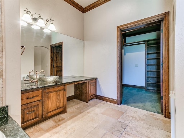 1031 Hidden Valley Ln, Choctaw, OK 73020 - bathroom featuring vanity, stone tile floors, and ornamental molding