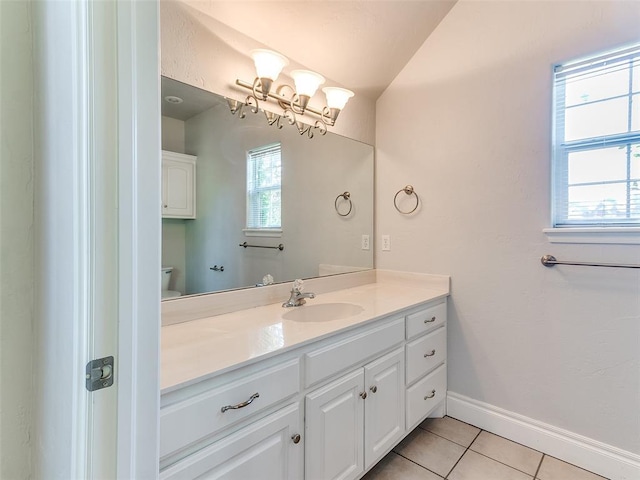1031 Hidden Valley Ln, Choctaw, OK 73020 - bathroom featuring tile patterned floors, vanity, and vaulted ceiling