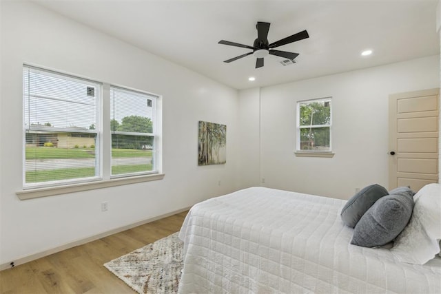 2800 NW 43rd St, Oklahoma City, OK 73112 - bedroom with wood finished floors, baseboards, recessed lighting, and ceiling fan
