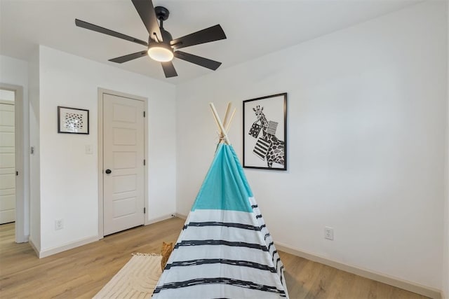 2800 NW 43rd St, Oklahoma City, OK 73112 - bedroom with light wood-type flooring, baseboards, and a ceiling fan